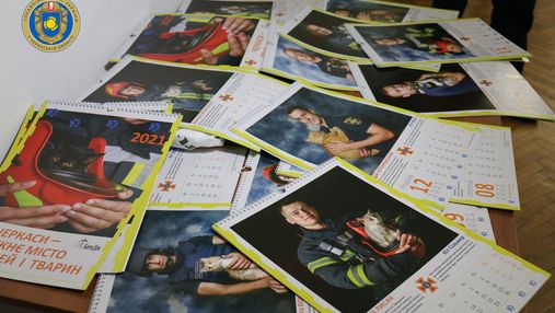 Черкаські рятувальники знялися для благодійного календаря: милі фото з котиками